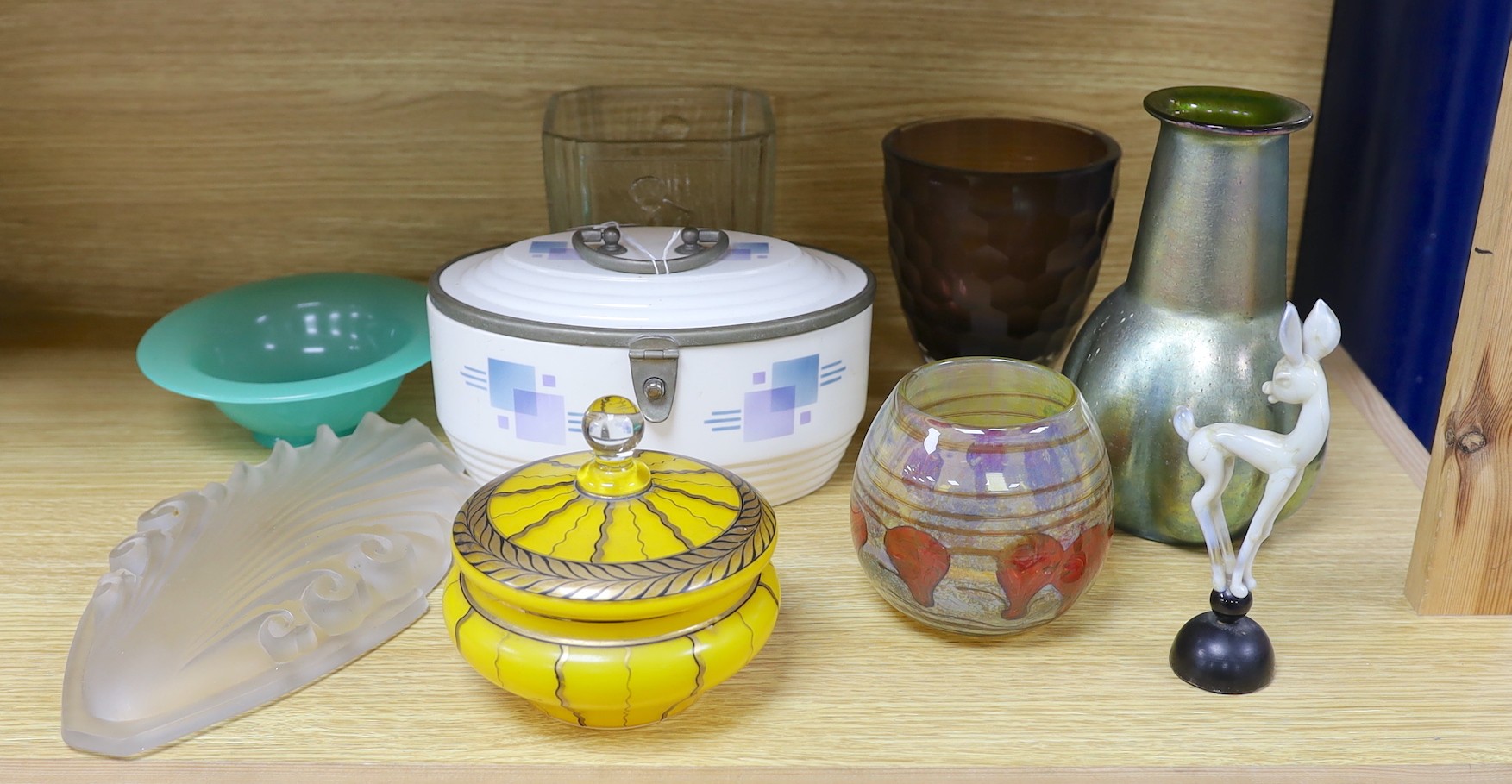 A group of art glass including a Loetz iridescent vase, an Istvan Komaromy faun sculpture, a Povotny style powder jar and cover, four vases, a shade together with a WMF pottery sandwich box, tallest 20cm